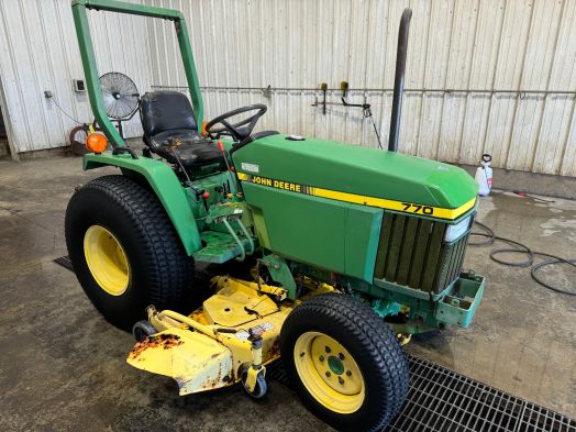 John Deere 770 4x4 tractor with mower